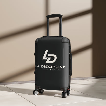 La Discipline Logo Carry-On Suitcase – Black Hard-Shell Travel Luggage Printify