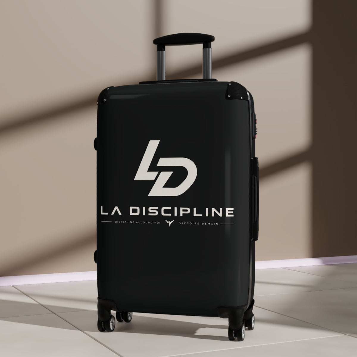 La Discipline Logo Carry-On Suitcase – Black Hard-Shell Travel Luggage Printify